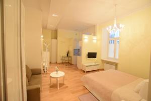Televízia a/alebo spoločenská miestnosť v ubytovaní Elegant Apartment Foksal