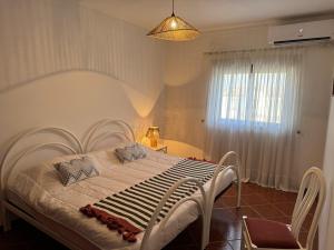 Postel nebo postele na pokoji v ubytování Apartamento Torre da Medronheira