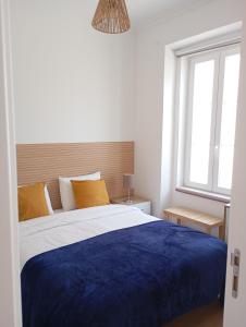 Giường trong phòng chung tại Sol e Rio