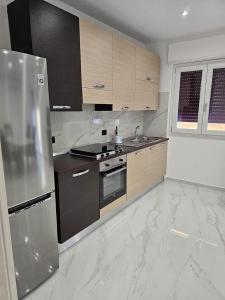 Η κουζίνα ή μικρή κουζίνα στο Exclusive Apartment