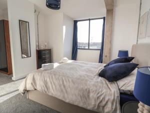 Ένα ή περισσότερα κρεβάτια σε δωμάτιο στο The Works by DAG