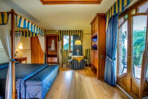 A bed or beds in a room at Hotel Casale