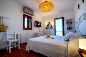 Ένα ή περισσότερα κρεβάτια σε δωμάτιο στο Villa Barbarosa +37 φωτογραφίες