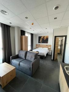 Postel nebo postele na pokoji v ubytování Apartamentos - Mirasur