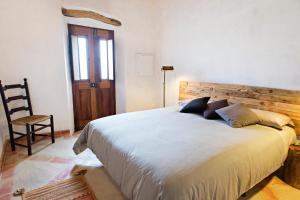 Säng eller sängar i ett rum på Quinta do Arade - casa 4 pétalas