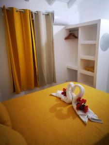 Postel nebo postele na pokoji v ubytování Villa avec piscine à Saint-François - 72 m² vue