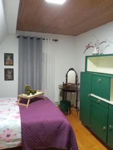 Postel nebo postele na pokoji v ubytování Household Jakic