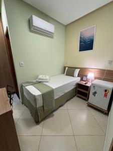 Postel nebo postele na pokoji v ubytování Domus Hotel Trindade - Canaã dos Carajás
