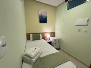 Postel nebo postele na pokoji v ubytování Domus Hotel Trindade - Canaã dos Carajás