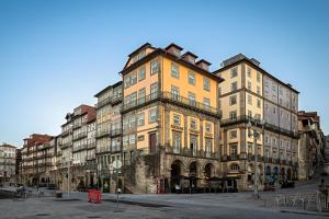 a group of tall buildings on a city street at Pestana Vintage Porto Hotel & World Heritage Site in Porto