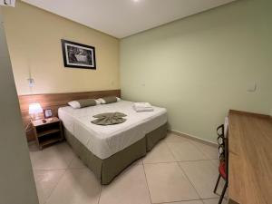 Postel nebo postele na pokoji v ubytování Domus Hotel Trindade - Canaã dos Carajás
