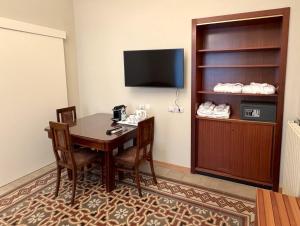 TV a/nebo společenská místnost v ubytování Hotel Palladio + 31 fotografií