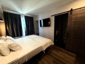 Postel nebo postele na pokoji v ubytování Bkway Hotel Brooklyn