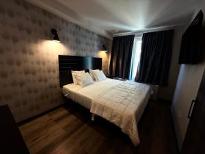 Postel nebo postele na pokoji v ubytování Bkway Hotel Brooklyn