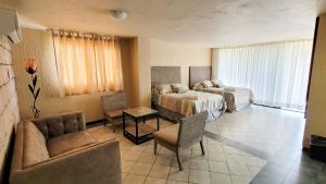 Χώρος καθιστικού στο HOTEL MARIA ISABEL DE IGUALA