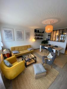 Posezení v ubytování Appartement lumineux 70 m2 proche centre