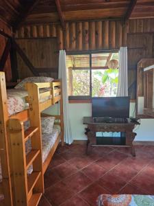 Postel nebo postele na pokoji v ubytování Cabinas Nirvana + 26 fotografií