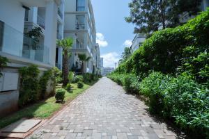 Charming Flat with Pool view Fast Wi-Fi外面的花园