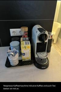 a coffee maker sitting on top of a counter at Apartment Ferienregion Bergstraße in Bickenbach