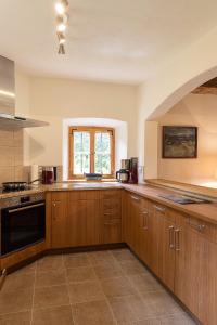 Kuchyň nebo kuchyňský kout v ubytování Ferienhaus Nöstlbach