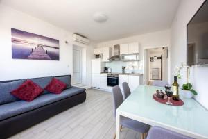Kuchyň nebo kuchyňský kout v ubytování Ancora Center Apartment