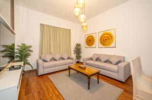 Posezení v ubytování Live spacious 3BR apartment all En Suite & Balcony