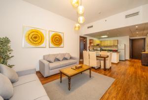 Posezení v ubytování Live spacious 3BR apartment all En Suite & Balcony