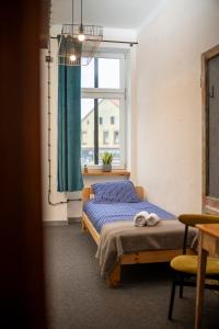 Łóżko lub łóżka w pokoju w obiekcie 5 Porte