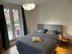 Postel nebo postele na pokoji v ubytování Le Paradis Mosan