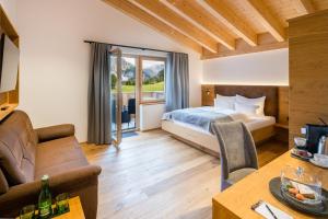 Posteľ alebo postele v izbe v ubytovaní Hotel Regnum Zegg