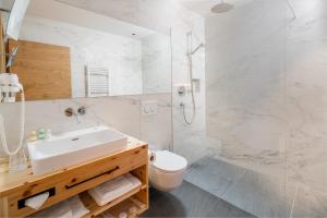 Kúpeľňa v ubytovaní Hotel Regnum Zegg + 37 fotografií