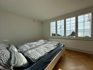 Postel nebo postele na pokoji v ubytování Maison pieds dans l'eau