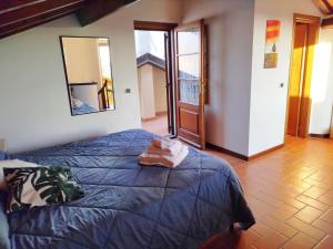 Ένα ή περισσότερα κρεβάτια σε δωμάτιο στο Casa Vacanze Versilia Mare