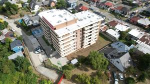 an overhead view of a large building in a city at Céntrico Departamento, Ochagavia in Puerto Montt