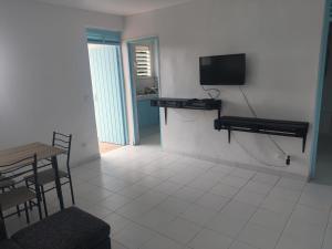 TV in/ali zabaviščno središče v nastanitvi Apt Tout Confort vue montagne