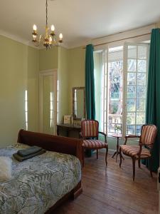 Ένα ή περισσότερα κρεβάτια σε δωμάτιο στο Maison Vive La Vie