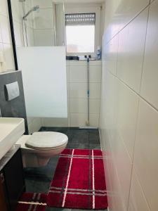 Koupelna v ubytování Birgeler Home + 12 fotografií