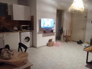 Kuchyň nebo kuchyňský kout v ubytování Appartement a Salambo