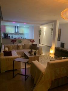 Posezení v ubytování Appartement a Salambo