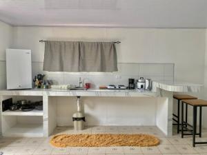 Kuchyň nebo kuchyňský kout v ubytování Anluka-House + 9 fotografií