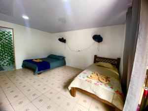 Postel nebo postele na pokoji v ubytování Anluka-House