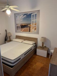 En eller flere senge i et værelse på Villetta Giulia