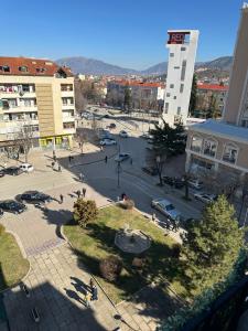 an aerial view of a city with a street at Isea Studio Apartment in Korçë