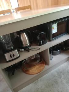 Η κουζίνα ή μικρή κουζίνα στο Habitación en Casita, PH