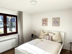 Ένα ή περισσότερα κρεβάτια σε δωμάτιο στο Spacious & Bright Family Escape
