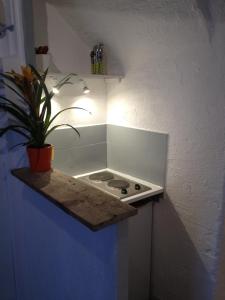 Kuchyň nebo kuchyňský kout v ubytování Appartement L'Atypique