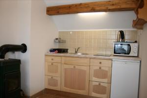 Kuchyň nebo kuchyňský kout v ubytování Farmica, Bed&Breakfast, Bazen izdvojen nekoliko minuta hoda