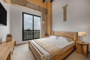 Postel nebo postele na pokoji v ubytování Poblado, 5 min to San Lucas Plaza, Free parking 316