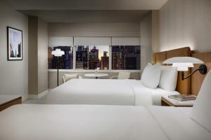 Postel nebo postele na pokoji v ubytování Hyatt Regency Times Square