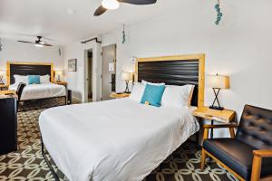 Postel nebo postele na pokoji v ubytování Highliner Hotel